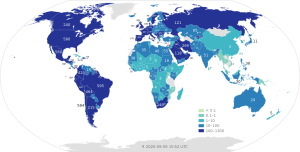 A world map showing total per capita COVID-19 deaths per million population