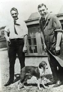 A black and white photograph of Dr. Charles H. Best and Sir Frederick Banting