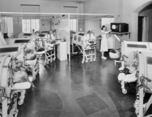 A room full of "iron lung" patients