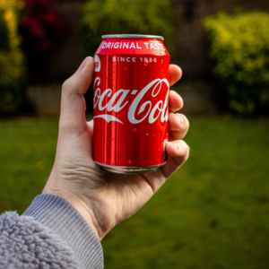 Person Holding Coca-cola Soda Can